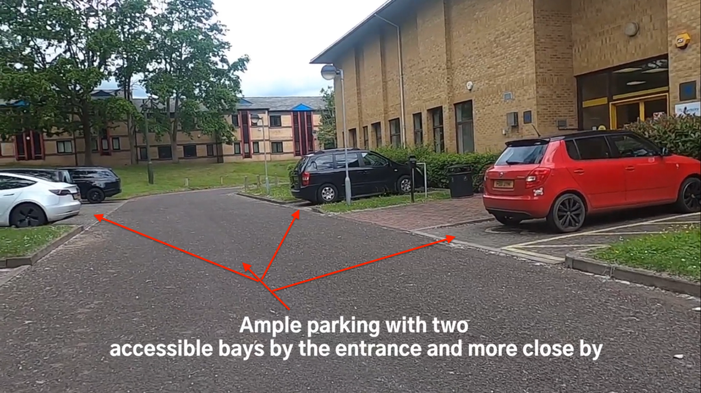 Parking spaces outside Westwood House in Coventry. The image is marked up with directional arrows showing the parking spaces allocated to MD Support Centre
